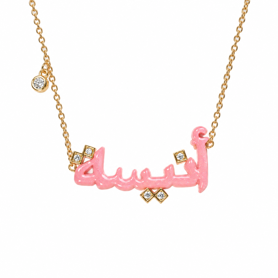 custom name necklace with dots and a charm